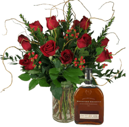 Premium Dozen Roses and a bottle of Woodford Reserve! Gorgeous long-stem roses with premium accents in a beautiful cylinder vase are paired with a bottle of Woodford Reserve bourbon